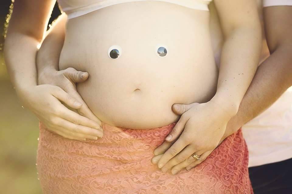 a picture of a baby on an expectant mothers belly explaining the needs for drug rehabs for pregnant women in Fort Lauderdale Florida.
